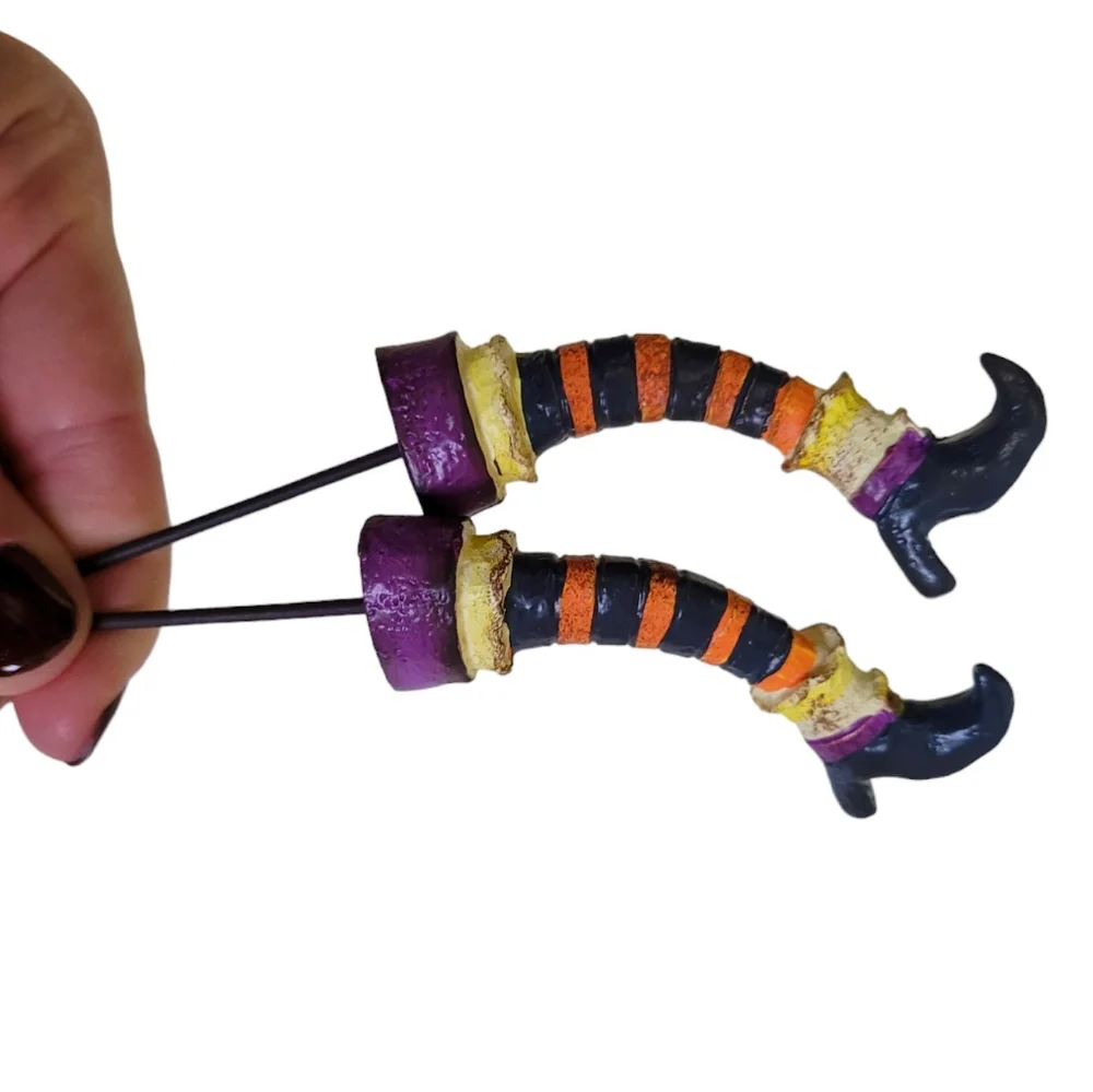 Miniature whimsical ceramic Halloween witch leg picks for crafting, decorating